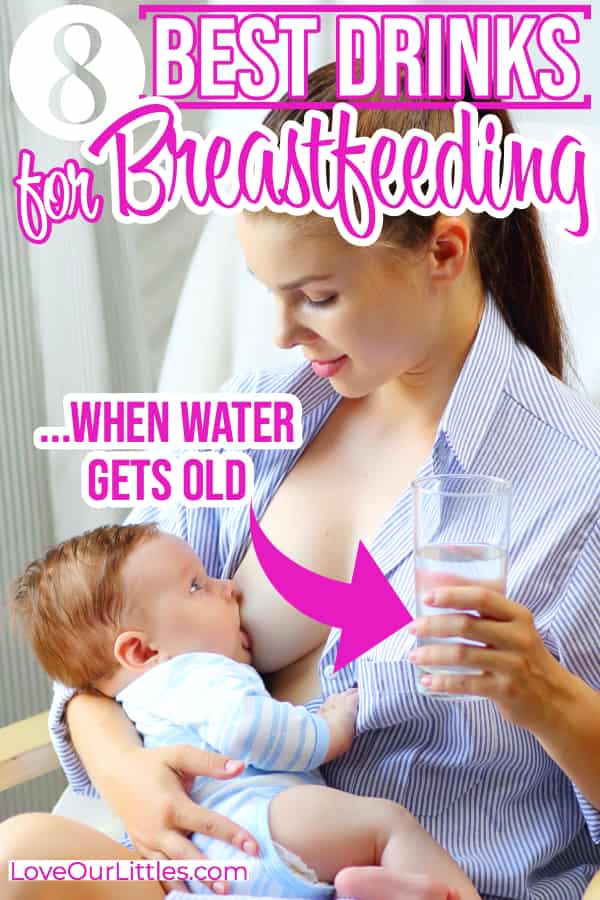 Woman breastfeeding while she drinks a glass of water.